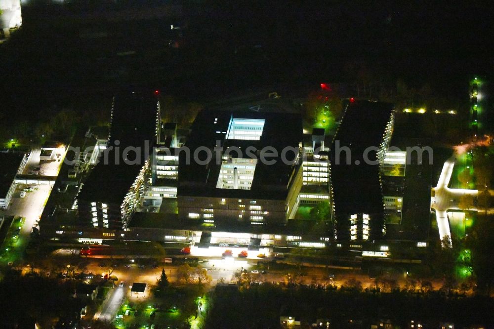 Aerial photograph at night Berlin - Night lighting Hospital grounds of the Clinic Conpus Benjonin Franklin on Hindenburgdonm in the district Steglitz in Berlin, Germany