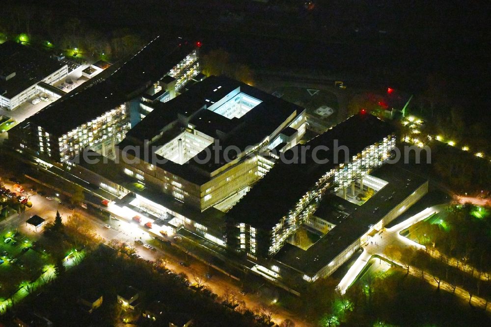 Aerial image at night Berlin - Night lighting Hospital grounds of the Clinic Conpus Benjonin Franklin on Hindenburgdonm in the district Steglitz in Berlin, Germany