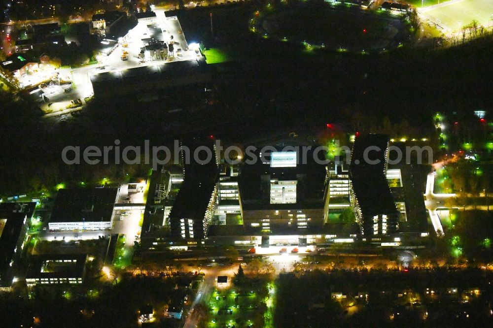 Aerial photograph at night Berlin - Night lighting Hospital grounds of the Clinic Conpus Benjonin Franklin on Hindenburgdonm in the district Steglitz in Berlin, Germany