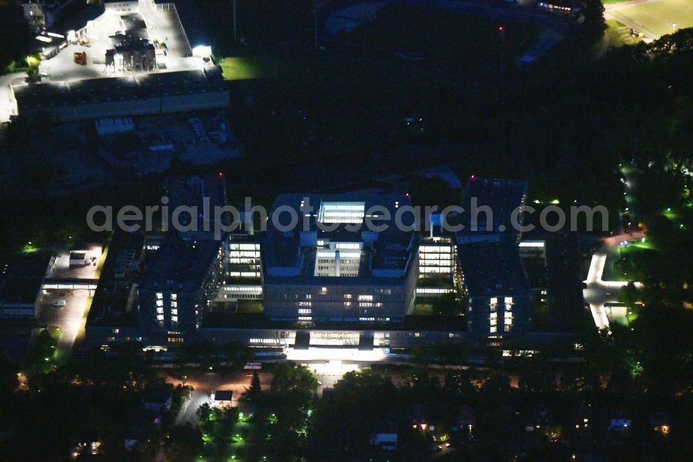 Berlin at night from above - Night lighting Hospital grounds of the Clinic Conpus Benjonin Franklin on Hindenburgdonm in the district Steglitz in Berlin, Germany