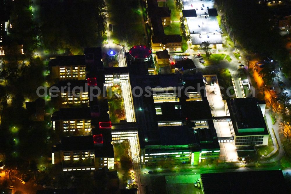 Aerial photograph at night Berlin - Night lighting hospital grounds of the accident clinic in the district Marzahn-Hellersdorf in Berlin