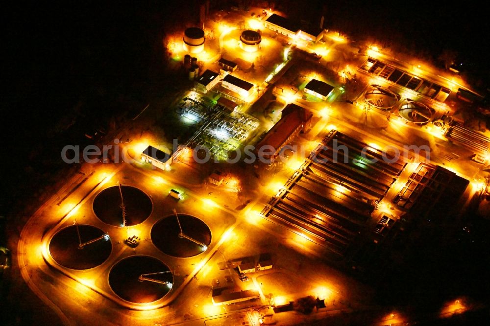 Aerial image at night Stahnsdorf - Night lighting sewage works Basin and purification steps for waste water treatment Stahnsdorf in Stahnsdorf in the state Brandenburg
