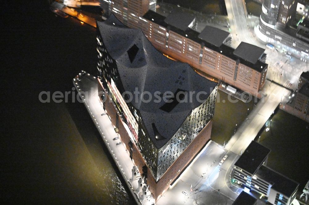 Aerial photograph at night Hamburg - Night lighting the Elbe Philharmonic Hall on the river bank of the Elbe in Hamburg