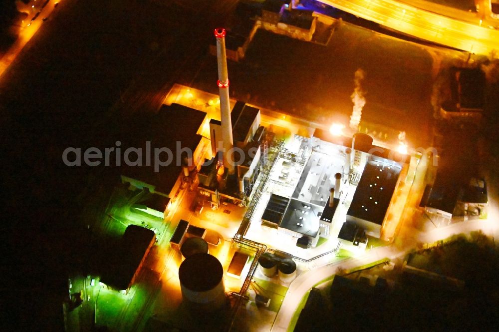 Aerial image at night Dessau - Night lighting power plants and exhaust towers of thermal power station in Dessau in the state Saxony-Anhalt, Germany