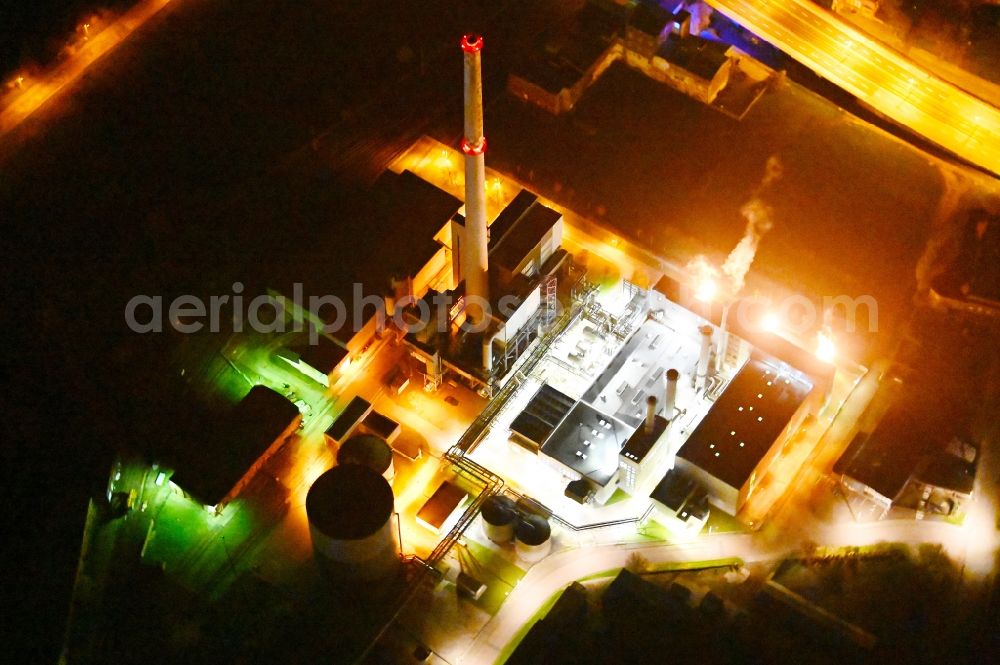 Dessau at night from above - Night lighting power plants and exhaust towers of thermal power station in Dessau in the state Saxony-Anhalt, Germany