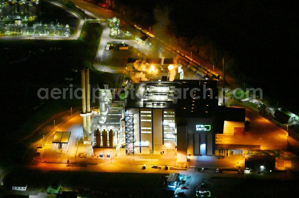 Aerial image at night Bernburg (Saale) - Night lighting power plants and exhaust towers of Waste incineration plant station of Pre Zero Energy in Bernburg (Saale) in the state Saxony-Anhalt, Germany