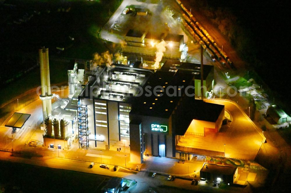 Aerial photograph at night Bernburg (Saale) - Night lighting power plants and exhaust towers of Waste incineration plant station of Pre Zero Energy in Bernburg (Saale) in the state Saxony-Anhalt, Germany