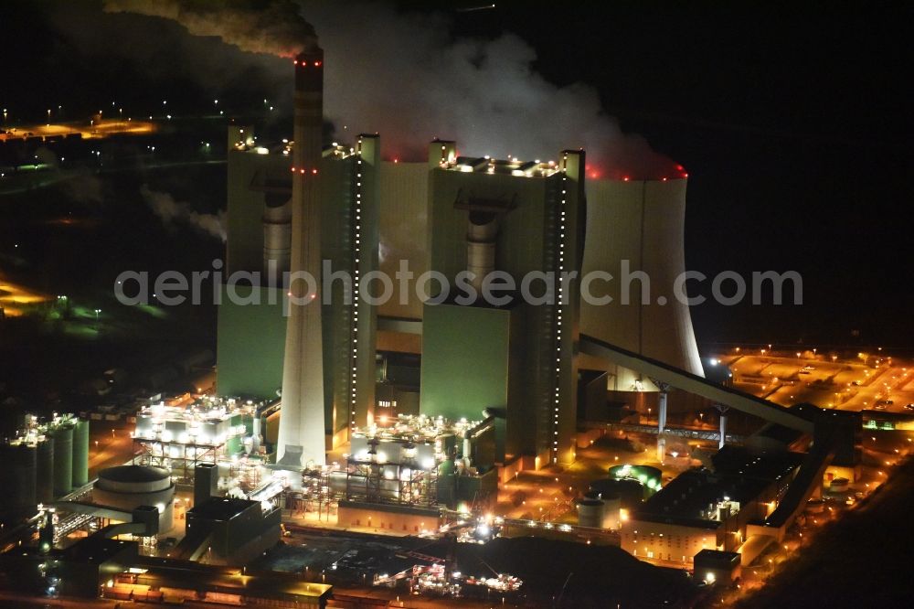 Aerial image at night Schkopau - Night lighting power plants and exhaust towers of thermal power station in the district Hohenweiden in Schkopau in the state Saxony-Anhalt, Germany