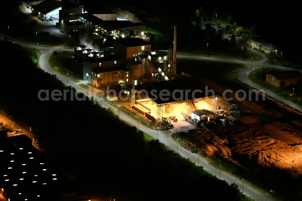 Eberswalde at night from above - Night lighting night lighting white exhaust smoke plumes from the power plants and exhaust towers of the wood-fired cogeneration plant 1Heiz Pellets in Eberswalde in the state Brandenburg, Germany