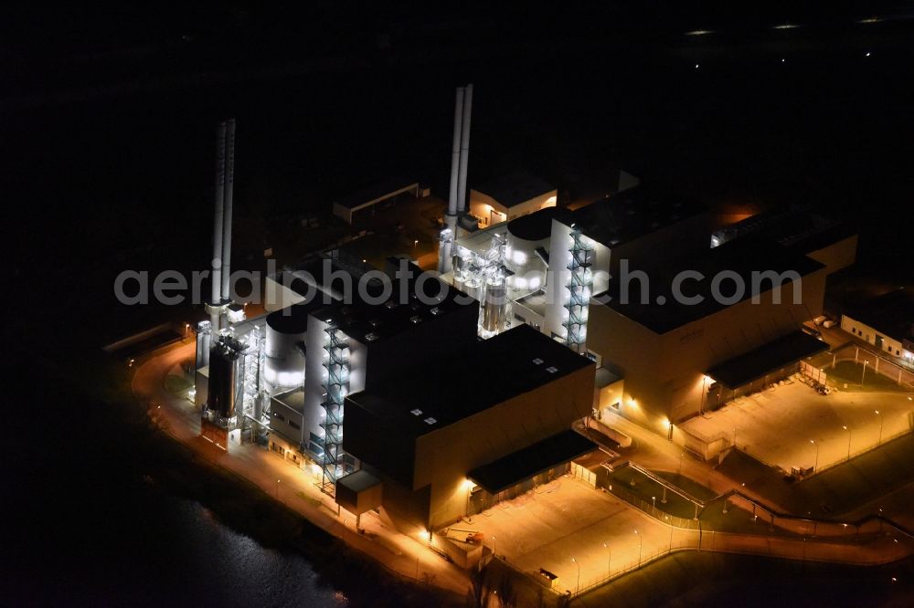 Magdeburg at night from above - Night lighting power plants and exhaust towers of thermal power station Rothensee in Magdeburg in the state Saxony-Anhalt