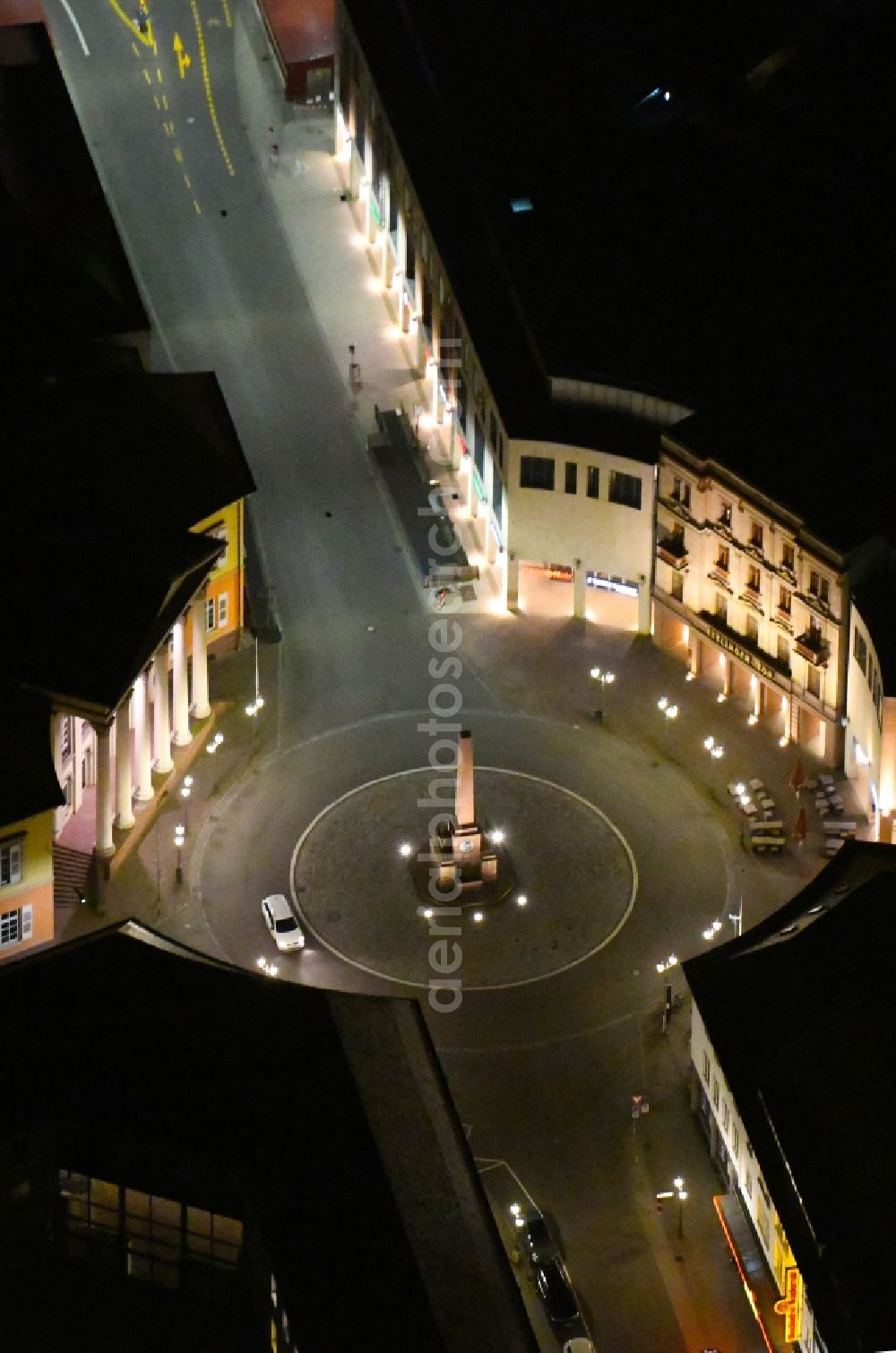Karlsruhe at night from above - Night lighting circular surface - Place Rondellplatz on shopping mall Ettliner Tor in Karlsruhe in the state Baden-Wurttemberg, Germany