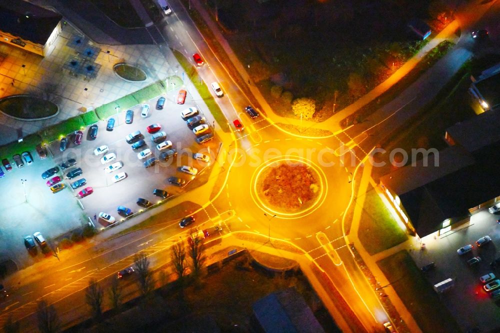 Aerial photograph at night Strausberg - Night lighting Traffic management of the roundabout road Proetzeler Chaussee in Strausberg in the state Brandenburg, Germany