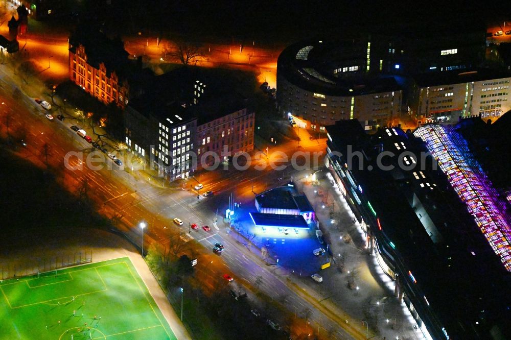 Berlin at night from the bird perspective: Night lighting road over the crossroads Berliner Strasse - Am Borsigturm in the district Reinickendorf in Berlin, Germany