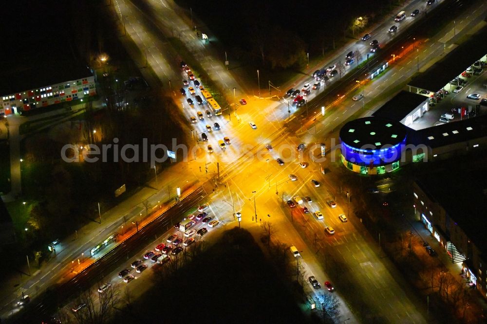 Berlin at night from the bird perspective: Night lighting road over the crossroads Blumberger Damm corner Landsberger Allee in the district Marzahn in Berlin, Germany