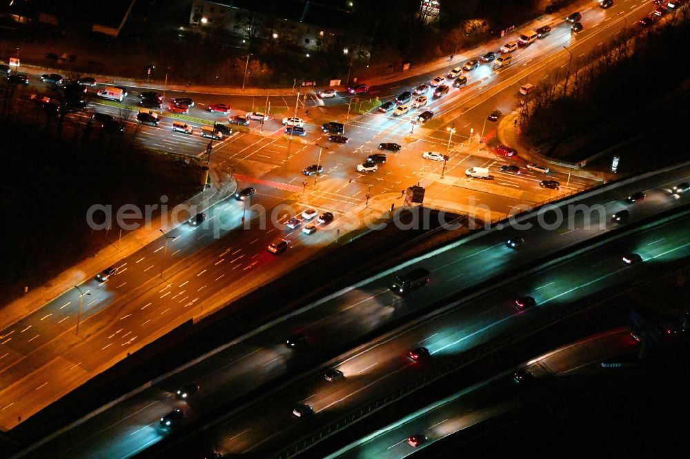 München at night from above - Night lighting road over the crossroads on street Foehringer Ring - Ungererstrasse - Situlisstrasse - motorway A9 in the district Freimann in Munich in the state Bavaria, Germany