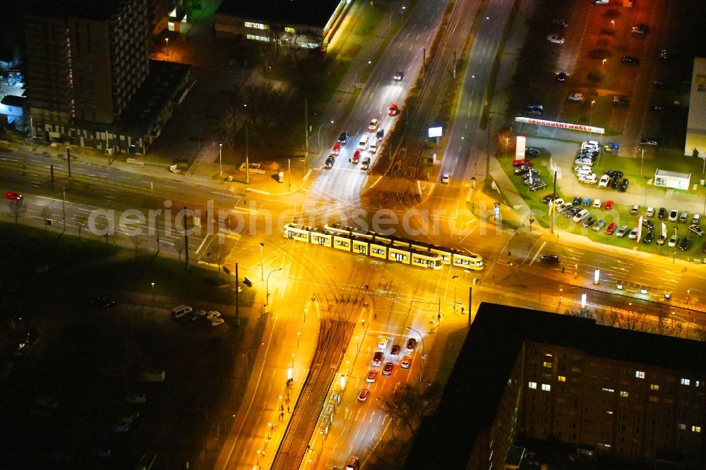 Berlin at night from above - Night lighting road over the crossroads Rhinstrasse - Allee of Kosmonauten in the district Marzahn in Berlin, Germany