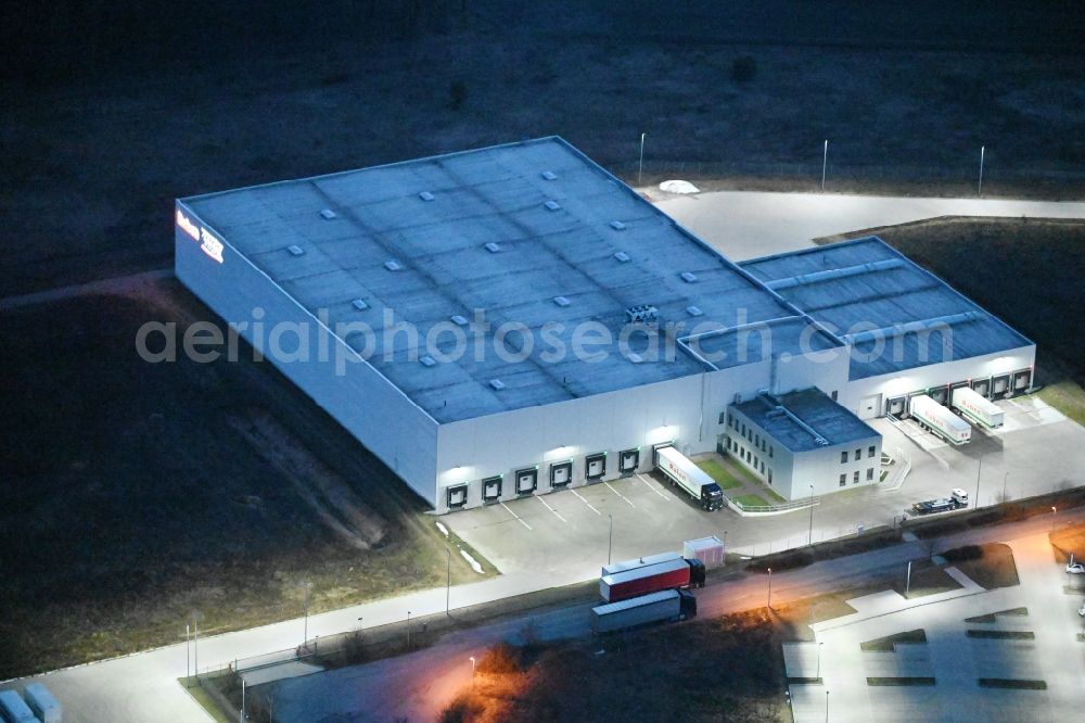 Fahrbinde at night from above - Night lighting warehouses and forwarding building of Raben Trans European Germany in Fahrbinde in the state Mecklenburg - Western Pomerania, Germany