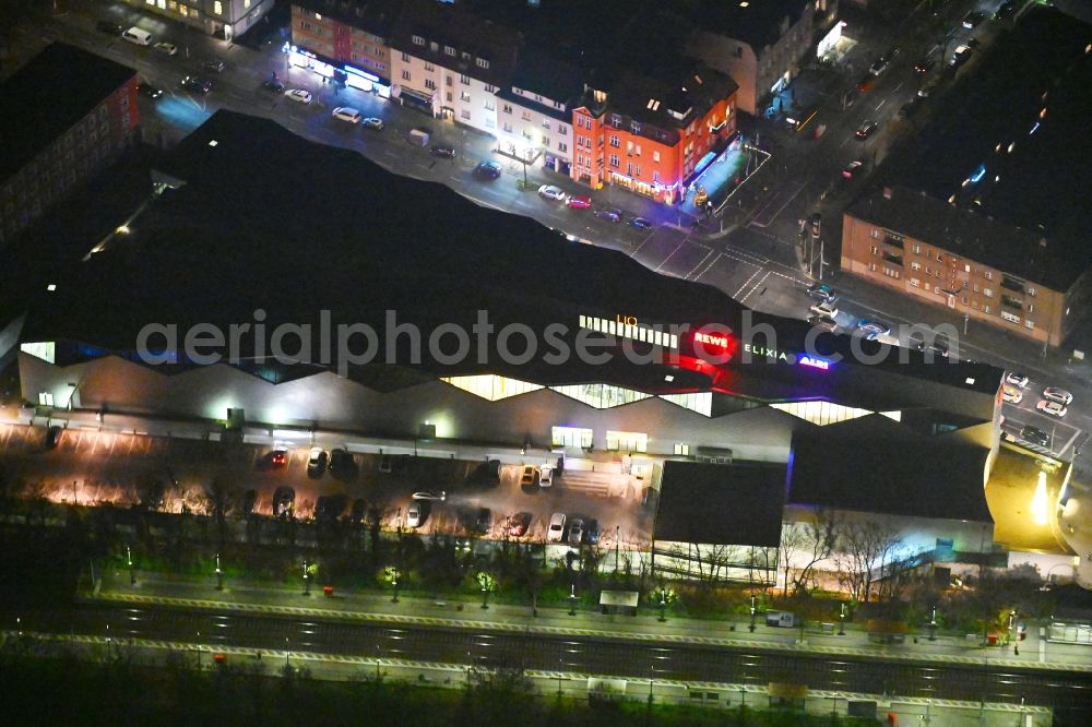 Aerial photograph at night Berlin - Night lighting lIO mall on the Lankwitzer street in Berlin - Lichterfelde
