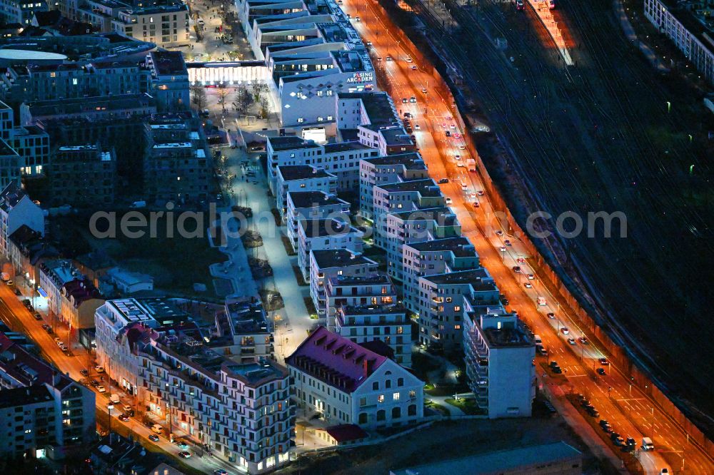 München at night from above - Night lighting multi-family residential complex Kuvertfabrik in the district Pasing-Obermenzing in Munich in the state Bavaria, Germany