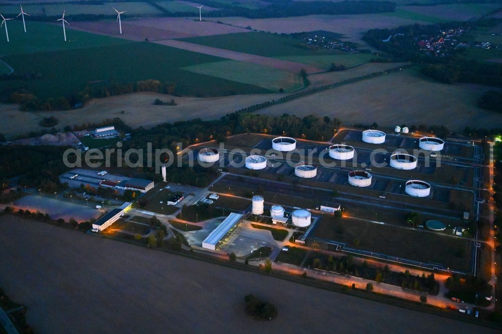 Seefeld-Löhme at night from above - Night lighting mineral oil - high storage tanks for gasoline and diesel fuels in Seefeld in Brandenburg