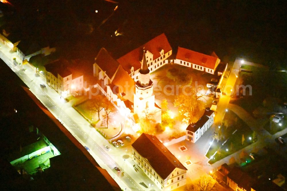 Aerial photograph at night Coswig (Anhalt) - Night lighting museum building ensemble Klosterhof in Coswig (Anhalt) in the state Saxony-Anhalt, Germany