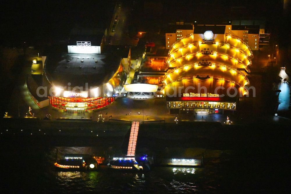 Hamburg at night from above - Night lighting Musical Theatre, Stage entertainment on the banks of the Elbe in Hamburg Steinwerder