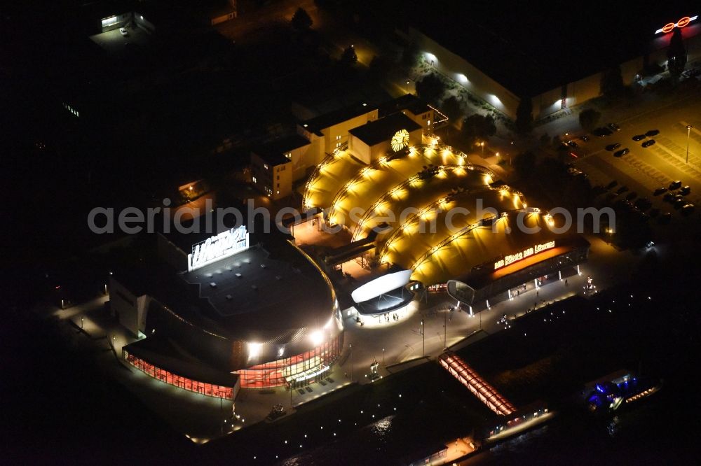 Aerial image at night Hamburg - Night view Building of the new Musical Theatre, Stage entertainment on the banks of the Elbe in Hamburg Steinwerder