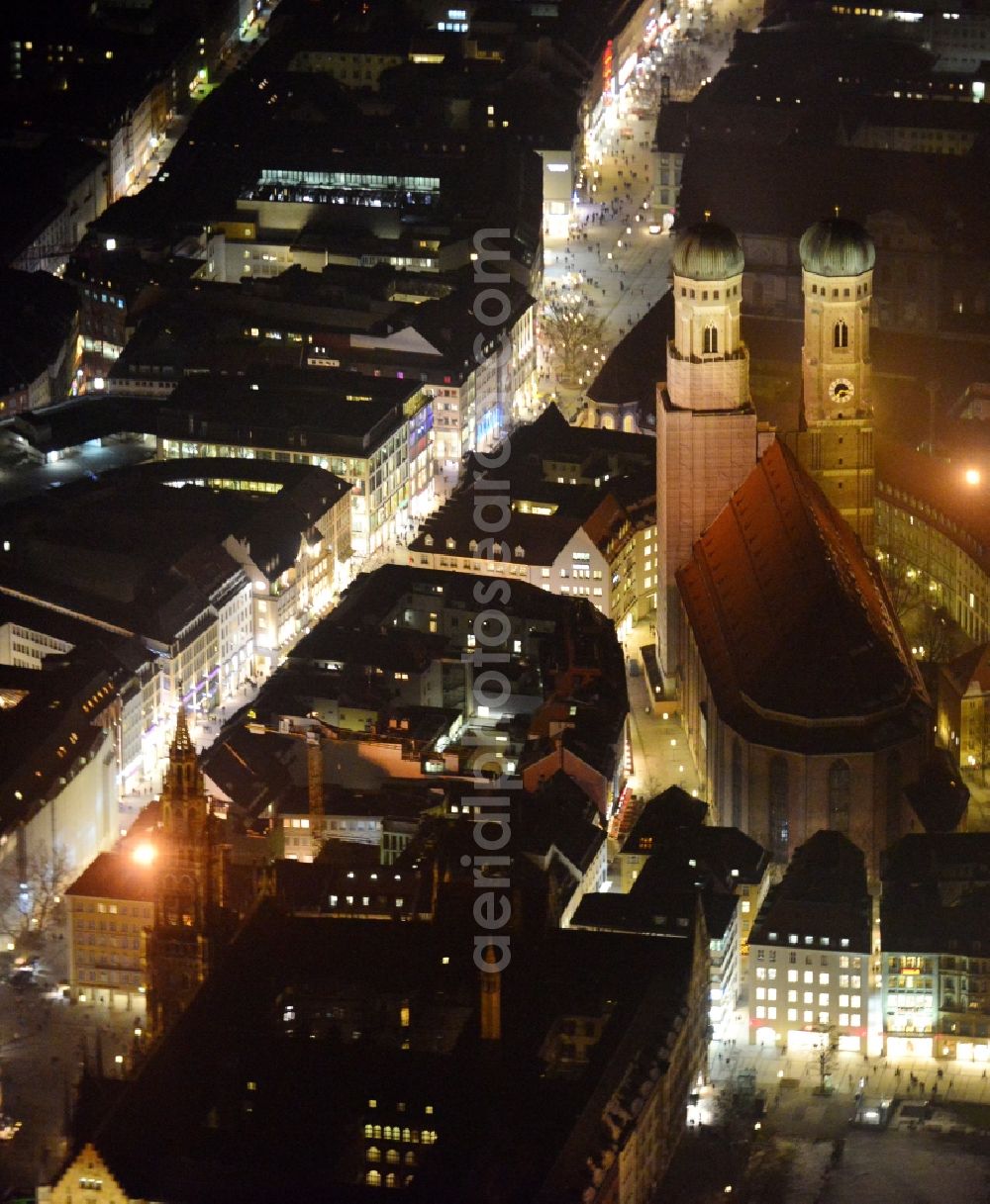 Aerial image at night München - City view of the Old Town at the Frauenkirche at the New Town Hall in the center of Munich in Bavaria