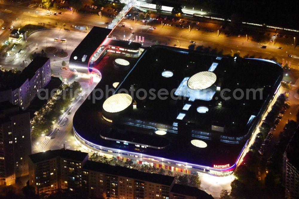 Berlin at night from above - Night Aerial View of Shopping Center East Gate with coherent nocturnal lighting. The development, general planning, leasing and long-term management of the Eastgate project management are in the hands of the ECE. The shopping center is located in the Marzahn district on the main road axis Maerkische Allee in Berlin