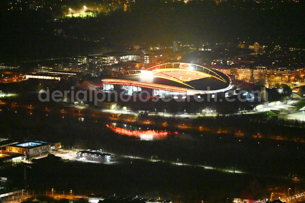 Aerial image at night Leipzig - Night lighting on the sports ground of the stadium Red Bull Arena Am Sportforum in Leipzig in the state Saxony, Germany