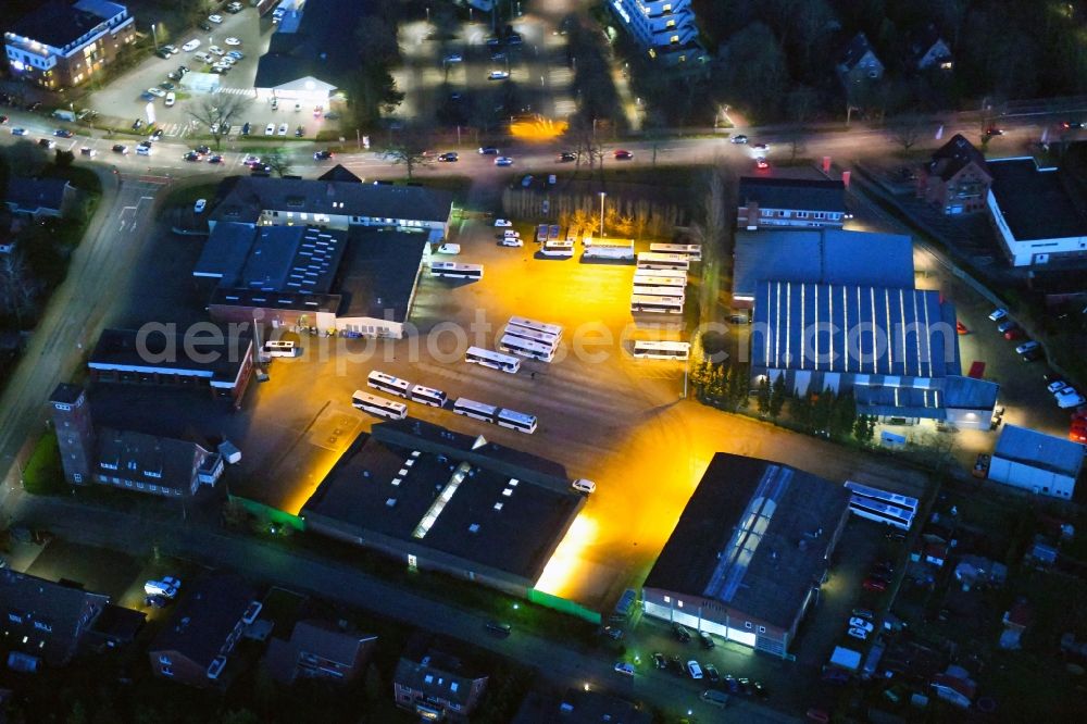 Stade at night from the bird perspective: Night lighting depot of the Municipal Transport Company KVG Stade GmbH & Co. KG on Harburger Strasse in Stade in the state Lower Saxony, Germany