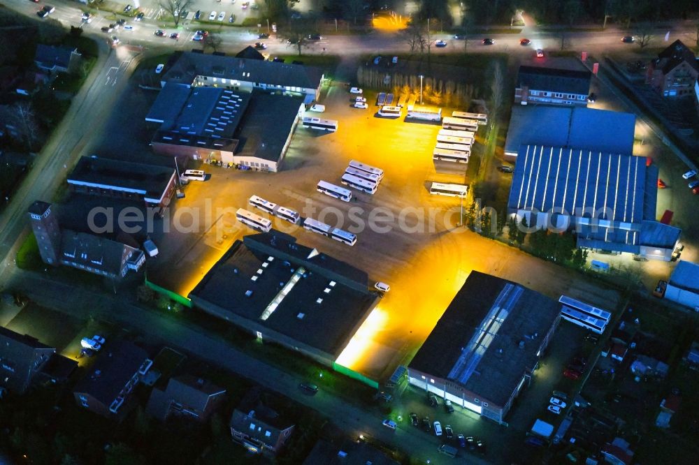 Aerial photograph at night Stade - Night lighting depot of the Municipal Transport Company KVG Stade GmbH & Co. KG on Harburger Strasse in Stade in the state Lower Saxony, Germany