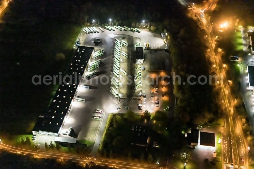 Aerial image at night Odense - Night lighting depot of the Municipal Transport Company in Odense in Syddanmark, Denmark