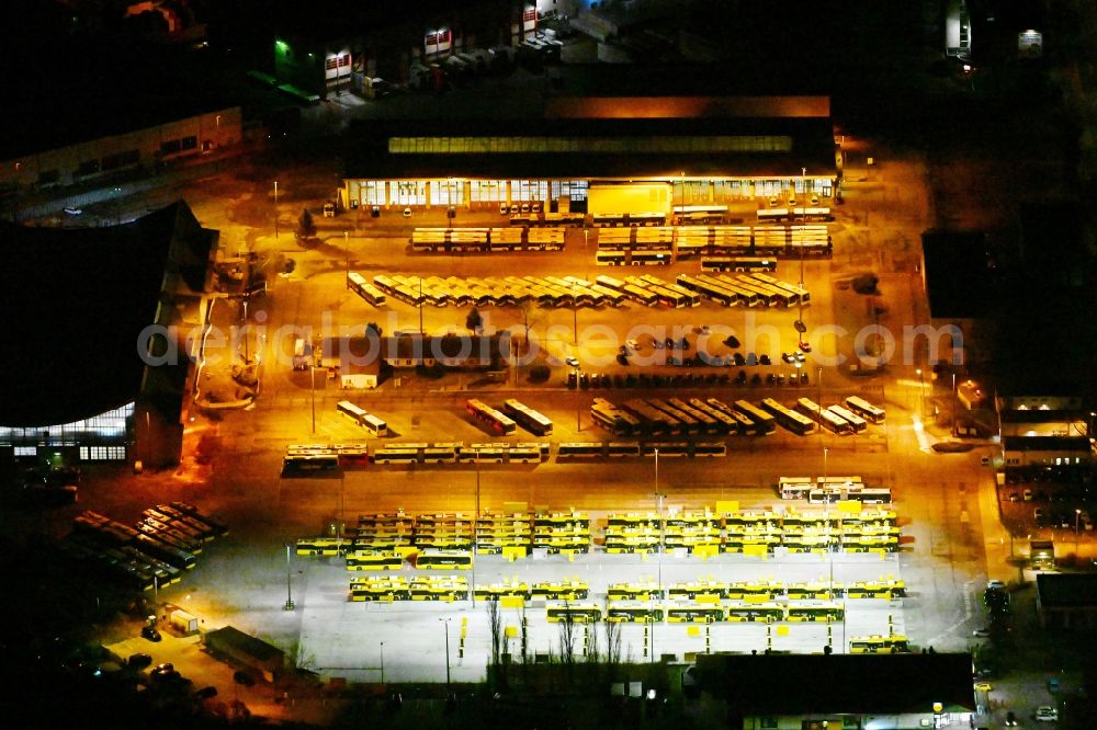 Berlin at night from above - Night lighting depot of the Municipal Transport Company on Indira-Gandhi-Strasse in the district Hohenschoenhausen in Berlin, Germany