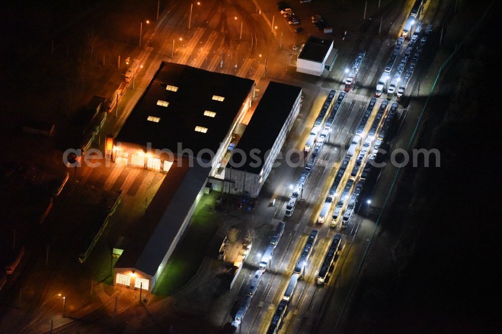 Aerial photograph at night Magdeburg - Night lighting Tram depot of the Municipal Transport Company MVB Magdeburger Verkehrsbetriebe in the district Rothensee in Magdeburg in the state Saxony-Anhalt