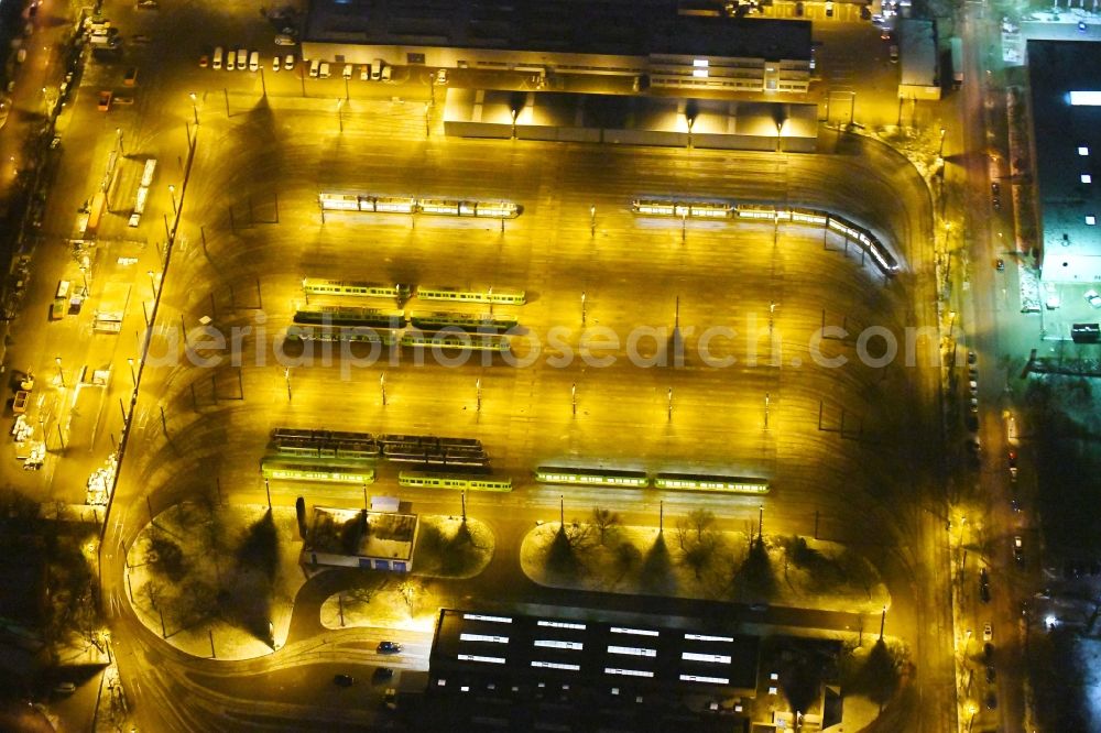 Aerial photograph at night Hannover - Night lighting Tram depot of the Municipal Transport Company of Stadtbahn Hannover on Thurnithistrasse in the district Doehren-Wuelfel in Hannover in the state Lower Saxony, Germany