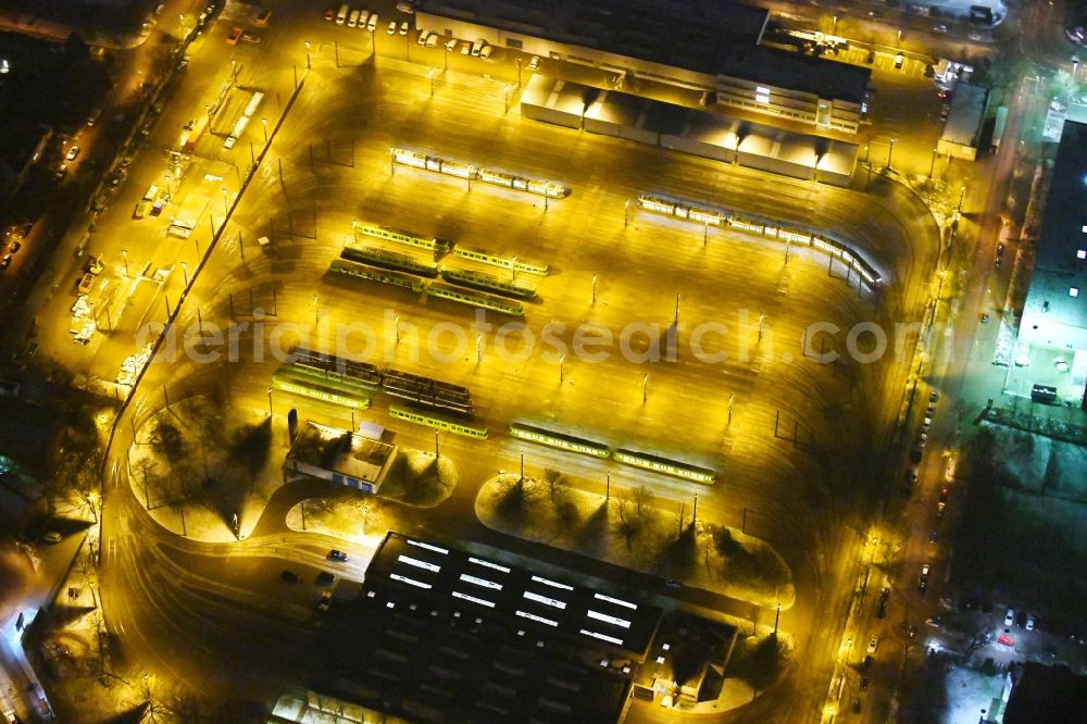 Aerial image at night Hannover - Night lighting Tram depot of the Municipal Transport Company of Stadtbahn Hannover on Thurnithistrasse in the district Doehren-Wuelfel in Hannover in the state Lower Saxony, Germany