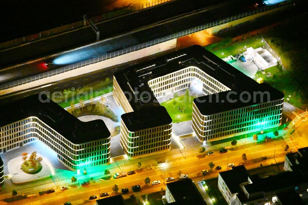 Aerial photograph at night Berlin - Night lighting construction site to build a new office and commercial building Brain Box Berlin in Berlin - Adlershof, Germany