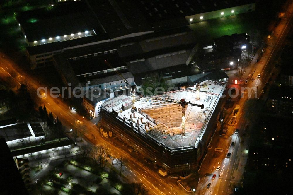 Hamburg at night from the bird perspective: Night lighting construction site to build a new office and commercial building on Bramfelder Chausee corner Werner-Otto-Strasse in the district Bramfeld in Hamburg, Germany