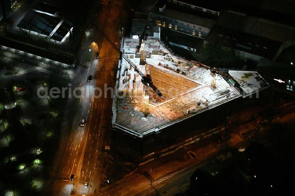 Aerial photograph at night Hamburg - Night lighting construction site to build a new office and commercial building on Bramfelder Chausee corner Werner-Otto-Strasse in the district Bramfeld in Hamburg, Germany