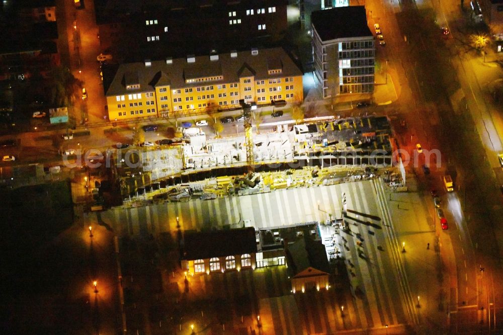Aerial photograph at night Berlin - Night lighting Construction site to build a new office and commercial building Am Forum and Ecowiss on Erich-Thilo-Strasse corner Rudower Chaussee in Berlin, Germany