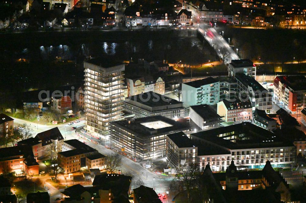 Aerial image at night Jena - Night lighting complementary new construction site on the campus-university building complex Campus Inselplatz on Loebdegraben - Steinweg in Jena in the state Thuringia, Germany