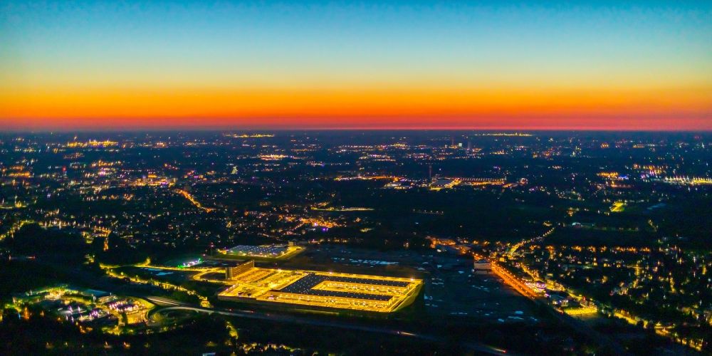 Bochum at night from above - Night lighting new building complex of DHL parcel and logistics center in the development area MARK 51A7 in Bochum in the state North Rhine-Westphalia, Germany
