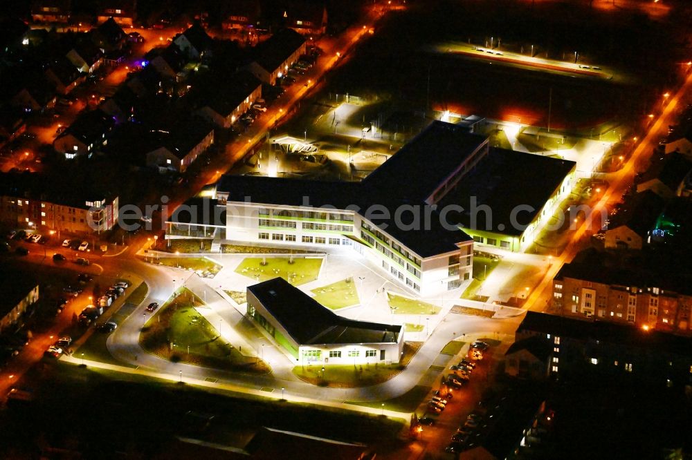 Hönow at night from above - Night lighting building city destrict center between of Schulstrasse and of Marderstrasse in Hoenow in the state Brandenburg, Germany