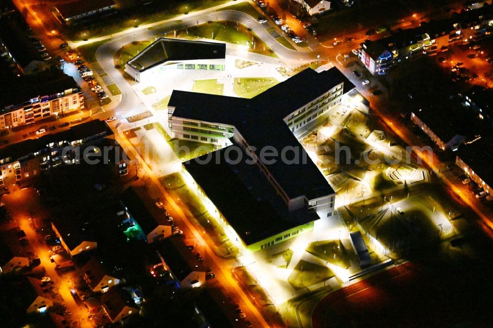 Aerial image at night Hönow - Night lighting building city destrict center between of Schulstrasse and of Marderstrasse in Hoenow in the state Brandenburg, Germany