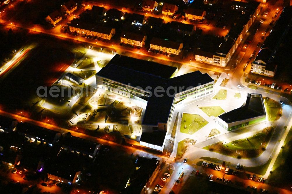 Aerial image at night Hönow - Night lighting building city destrict center between of Schulstrasse and of Marderstrasse in Hoenow in the state Brandenburg, Germany