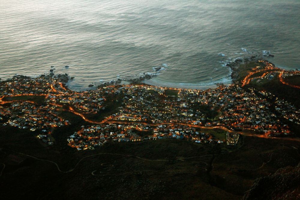Aerial photograph at night Kapstadt - Night view of Center on the seacoast of South Atlantic in Cape Town in Western Cape, South Africa