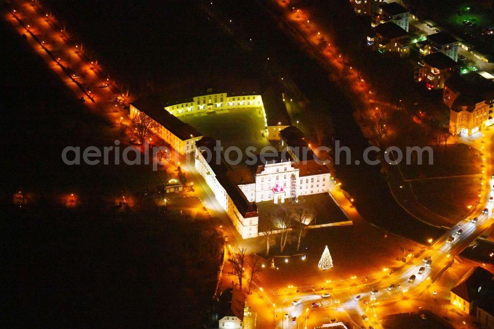 Aerial photograph at night Oranienburg - Night lighting Palace am Schlossplatz in Oranienburg in the state Brandenburg