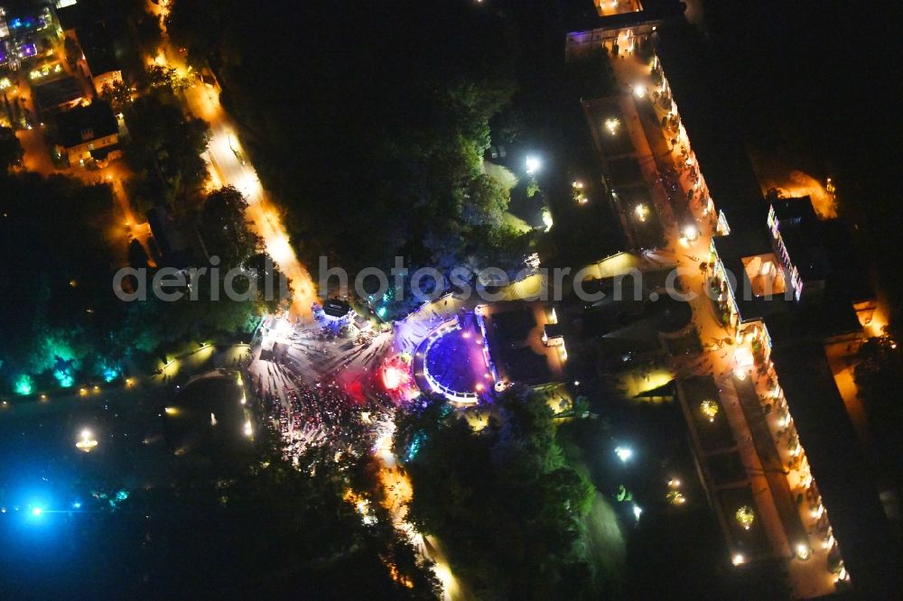 Aerial photograph at night Potsdam - Night coloring lighting park of Orangerieterrassen to the show Potsdam Castle Night 2019 on Maulbeerallee in the district Brandenburger Vorstadt in Potsdam in the state Brandenburg, Germany