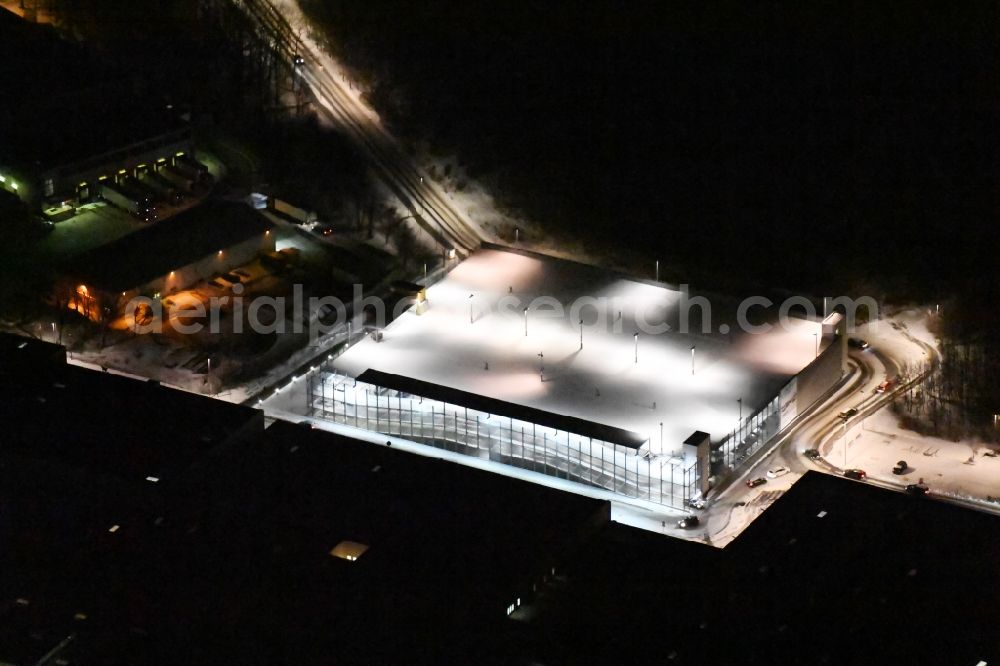 Aerial image at night Wildau - Night view park house of A10 motorway at the Center Federal BAB A10 in Wildau in Brandenburg